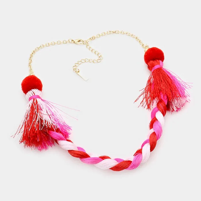 iLLASPARKZ Braided thread necklace with pom pom tassels